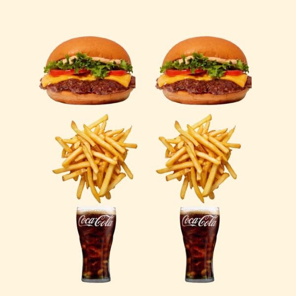 Two cheeseburgers with lettuce and tomato, paired with fries and Coca-Cola drinks on a cream background.